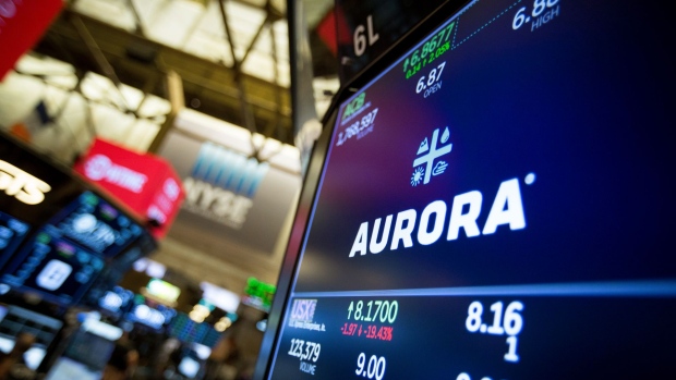 A monitor displays Aurora Cannabis Inc. signage on the floor of the New York Stock Exchange (NYSE) in New York, U.S., on Friday, Nov. 2, 2018. Stocks fell as Apple's poor forecast hit tech-heavy indexes. Treasuries declined after U.S. hiring rebounded more than forecast in October. 