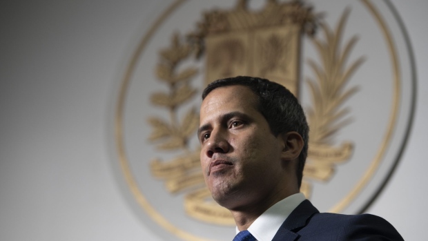 Juan Guaido, president of the National Assembly who swore himself in as the leader of Venezuela, listens during an interview at his office in Caracas, Venezuela, on Thursday, Sept. 19, 2019.