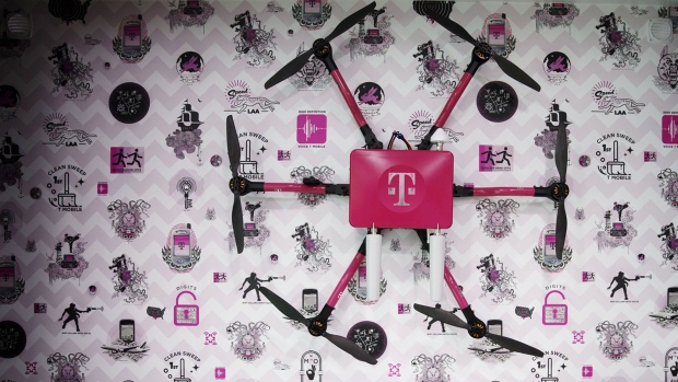 A T-Mobile US Inc. drone is displayed at the company's booth during the Mobile World Congress Americas event in Los Angeles, California, U.S., on Friday, Sept. 14, 2018. The conference features prominent executives representing mobile operators, device manufacturers, technology providers, vendors and content owners from across the world. 