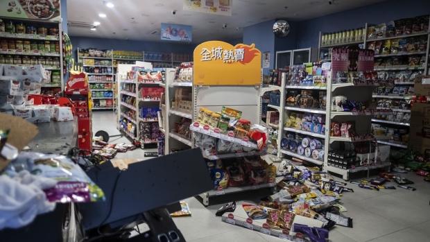 Merchandise scatter inside a vandalized Best Mart 360 store during a protest in Yau Ma Tei, Oct. 20. Photographer: Justin Chin/Bloomberg