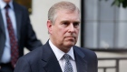 In this June 6, 2012 file photo, Britain's Prince Andrew leaves King Edward VII hospital in London