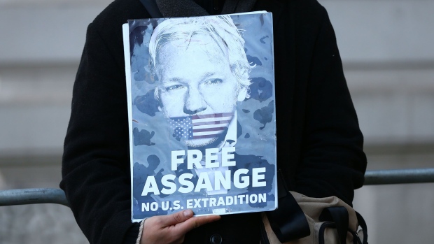 LONDON, ENGLAND - NOVEMBER 18: Julian Assange supporters demonstrate outside of the Westminster Magistrates Court on November 18, 2019 in London, England. (Photo by Hollie Adams/Getty Images)