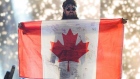 GETTY IMAGES  - BILLY RAY CYRUS HOLDS UP A CANADIAN FLAG