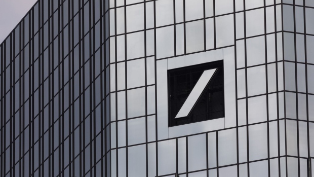 The Deutsche Bank AG logo sits on the bank's headquarters in Frankfurt, Germany, on Wednesday, July 25, 2018. Deutsche Bank vowed to maintain its position in fixed-income trading after recording its weakest second quarter in that business since the global financial crisis, as Chief Executive Officer Christian Sewing accelerates the lender’s turnaround effort. 