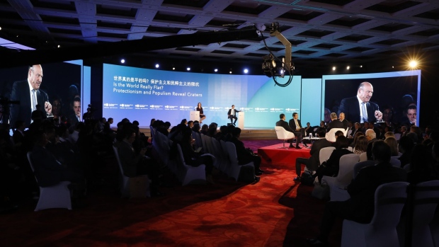 Gary Cohn, former assistant to the U.S. president and former director of U.S. National Economic Council, is displayed on screens as he speaks during a panel discussion at the Bloomberg New Economy Forum in Beijing, China, on Friday, Nov. 22, 2019. The New Economy Forum, organized by Bloomberg Media Group, a division of Bloomberg LP, aims to bring together leaders from public and private sectors to find solutions to the world's greatest challenges. 