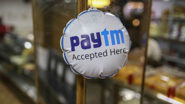 An advertising balloon for PayTM online payment advertisment, operated by One97 Communications Ltd., is displayed at a a general store in Ooty, Tamil Nadu, India, on Thursday, June 7, 2018. Most Asian markets were in the red on June 18 as concern that the row between U.S. and China may turn into a full-blown trade war. Most Asian markets were in the red on June 18 as concern that the row between U.S. and China may turn into a full-blown trade war. 