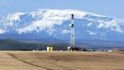 A Precision Drilling Corp. natural gas drilling rig about 60 miles southwest of Calgary, Alberta