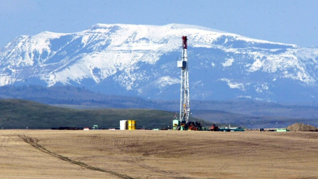 A Precision Drilling Corp. natural gas drilling rig about 60 miles southwest of Calgary, Alberta