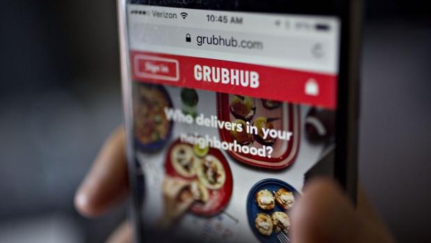 The GrubHub website an iPhone. 