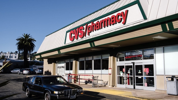 A car drives past a CVS Health Corp. store in Oakland, California, U.S., on Friday, Aug. 2, 2019. CVS is scheduled to release earnings figures on August 7. 