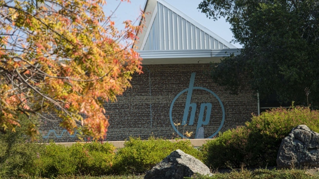 Signage is displayed outside HP Inc. headquarters in Palo Alto, California, U.S., on Thursday, Nov. 7, 2019. HP's board is still deliberating over a $33 billion takeover proposal from Xerox Holdings Corp., people familiar with the matter said, adding uncertainty to a potential blockbuster deal that would reshape the printing industry. 