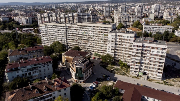 Soviet era apartment blocks and residential property stand on the city skyline in Varna, Bulgaria, on Thursday Oct. 10 2019. The region that straddles the Danube in Romania and Bulgaria has made it a bread basket for centuries but after fits and starts toward the free market, chronic shortages, corruption and political upheaval, it’s plugged into the world economy thanks to the EU’s open borders and money. 