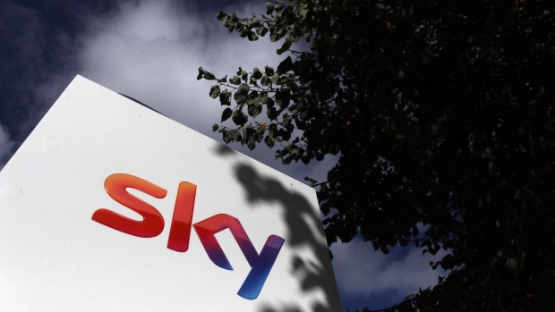 The Sky Plc logo is displayed outside of the company's headquarters in Isleworth, London, U.K., on Friday, Sept. 21, 2018. The future of British broadcaster Sky Plc will be decided with help from an influential body, The Takeover Panel, founded half a century ago to bring more discipline to M&A battles. 