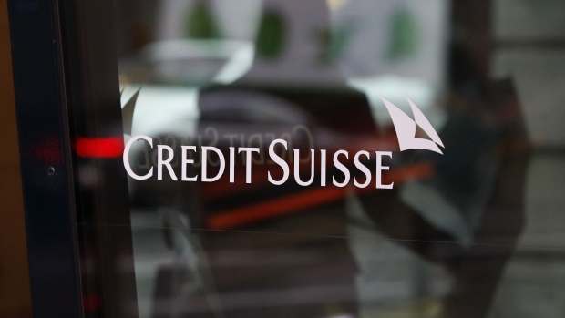 A Credit Suisse logo is displayed at entrance to a Credit Suisse Group AG bank branch in Zurich, Switzerland, on Wednesday, Oct. 30, 2019. Credit Suisse’s third-quarter results were boosted by gains at the key trading unit, bringing relief to Chief Executive Officer Tidjane Thiam as he seeks to emerge from a spying scandal that dented the bank’s reputation and cost him a key lieutenant. 