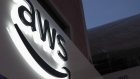 The logo of Amazon Web Services Inc (AWS) is displayed on a sign at a pop-up office ahead of the World Economic Forum (WEF) in Davos, Switzerland, on Monday, Jan. 21, 2019. World leaders, influential executives, bankers and policy makers attend the 49th annual meeting of the World Economic Forum in Davos from Jan. 22 - 25. 