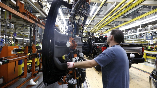DEARBORN, MI - SEPTEMBER 27: A Ford Motor Company workers works on a Ford F150 truck on the assembly line at the Ford Dearborn Truck Plant on September 27, 2018 in Dearborn, Michigan. The Ford Rouge Plant is celebrating 100 years as America's longest continuously operating auto plant. The factory produced Eagle Boats during WWI and currently produces the Ford F150 pickup truck. (Photo by Bill Pugliano/Getty Images)