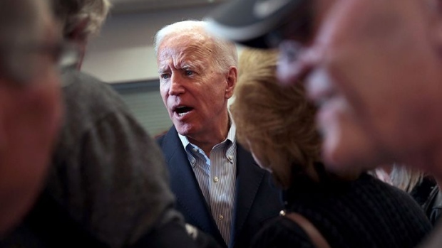 ALGONA, IOWA - DECEMBER 02: Democratic presidential candidate, former Vice President Joe Biden greets guests during a campaign stop at the Water's Edge Nature Center on December 2, 2019 in Algona, Iowa. The stop was part of Biden's 650-mile "No Malarkey" campaign bus trip through rural Iowa. The 2020 Iowa Democratic caucuses will take place on February 3, 2020, making it the first nominating contest for the Democratic Party in choosing their presidential candidate to face Donald Trump in the 2020 election. (Photo by Scott Olson/Getty Images)