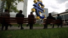 The euro sign sculpture outside the former European Central Bank (ECB) headquarters in Frankfurt, Germany, on Tuesday, Sept. 24, 2019. European banks started the week among the worst performers, dragged by German lenders after a slump in the country's manufacturing data. 
