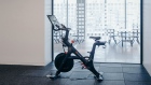 A Peloton Cycle Inc. bicycle stands in the gym area of the Dwight Capital LLC new office space inside 787 11th Avenue in New York, U.S., on Monday, July 30, 2018. The glitzy new offices at 787 11th Avenue in Hell's Kitchen for financial companies are a departure from the building's 1920s roots as a service hub for Packard Motor Car Co. Photographer: Johannes Berg/Bloomberg