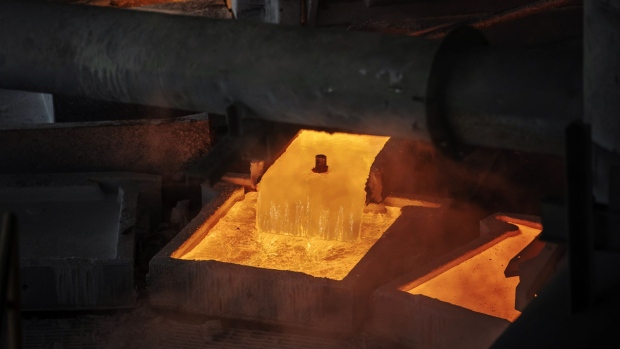 Molten copper flows a casting vessel at the Jinguan Copper smelter, operated by Tongling Nonferrous Metals Group Co., in Tongling, Anhui province, China, on Thursday, Jan. 17, 2019. On the heels of record refined copper output last year, China's No. 2 producer, Tongling, says it'll defy economic gloom and strive to churn out even more of the metal in 2019. 