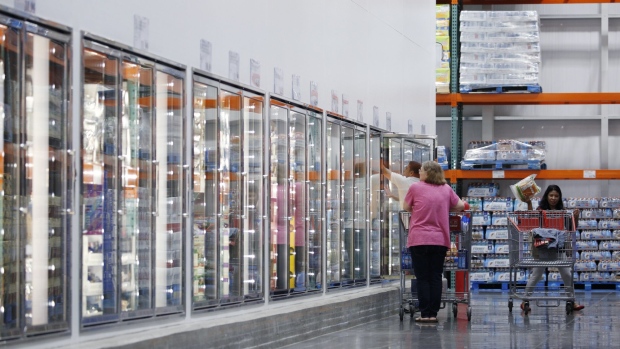 Customers shop in the frozen foods section at a Costco Wholesale Corp. store in Louisville, Kentucky, U.S., on Wednesday, May 29, 2019. Costco is scheduled to release earnings figures on May 30. 
