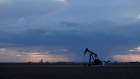 The silhouette of a pumpjack is seen in the Permian Basin near Orla, Texas, U.S., on Friday, March 2, 2018. 