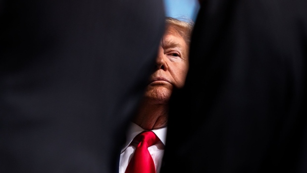 U.S. President Donald Trump pauses while speaking during an Economic Club of New York event in New York, U.S., on Tuesday, Nov. 12, 2019. Trump laid out the central pillar of his 2020 re-election campaign on Tuesday, telling the Economic Club of New York that his policies have generated a boom in growth and jobs. 