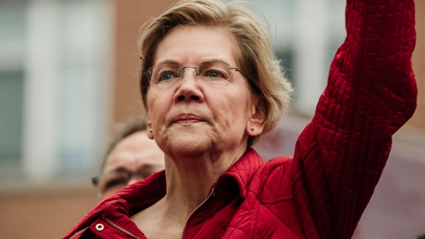 Senator Elizabeth Warren, a Democrat from Massachusetts and 2020 presidential candidate, attends a teachers strike outside the Oscar DePriest Elementary School in Chicago, Illinois, U.S., on Tuesday, Oct. 22, 2019. Along with higher salaries, the Chicago Teachers Union is asking the city and district to address social issues such as student homelessness. 