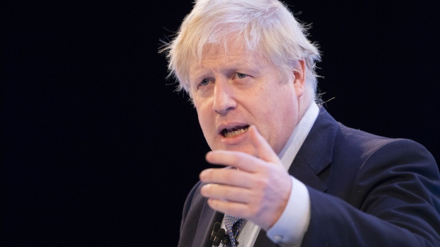 Boris Johnson, U.K. prime minister, gestures while speaking at the Confederation of British Industry (CBI) 2019 Annual Conference in London, U.K., on Monday, Nov. 18, 2019.
