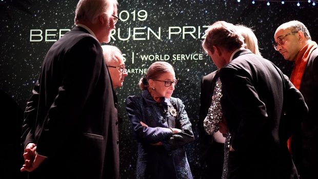 Ruth Bader Ginsburg, center, speaks to attendees at the Fourth Annual Berggruen Prize Gala in New York on Dec. 16, 2019.