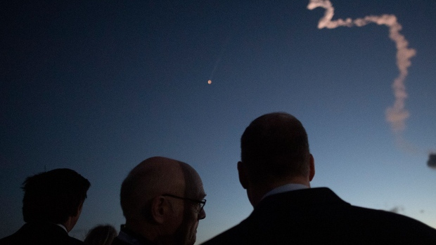 CAPE CANAVERAL, FLORIDA - DECEMBER 20: Florida Gov. Ron DeSantis (R), left, Tory Bruno, president and CEO of United Launch Alliance, and NASA Administrator Jim Bridenstine watch as a United Launch Alliance Atlas V rocket with Boeings CST-100 Starliner spacecraft onbaord launches from Space Launch Complex 41 at Cape Canaveral Air Force Station, Friday, Dec. 20, 2019