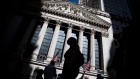 Pedestrians pass in front of the New York Stock Exchange (NYSE) in New York, U.S., on Friday, May 24, 2019. U.S. equities climbed at the end of a bruising week in which escalating trade tensions dominated markets. 