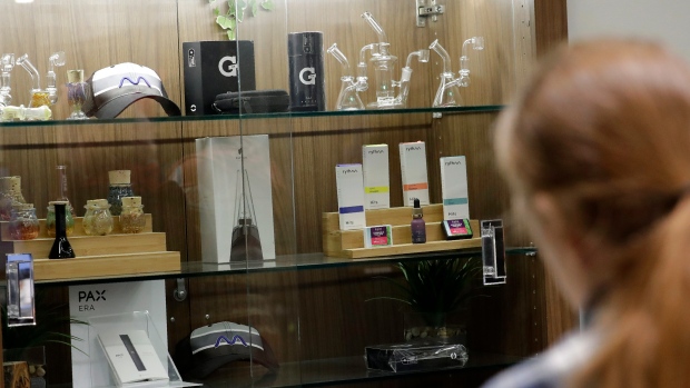 a registered medical marijuana patient looks at products at the Rise cannabis store in Mundelein