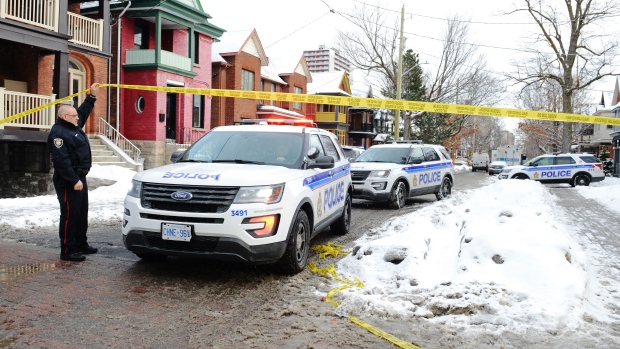 Police inspect the scene of a shooting in downtown Ottawa on Wednesday, January 8, 2020.