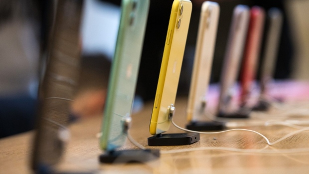 A row of Apple Inc. iPhone 11 smartphones stand on display inside the Regent Street Apple store during a product launch event in London, U.K., on Friday, Sept. 20, 2019. Apple's new iPhones with camera enhancements and improved battery life go on sale today. Photographer: Chris Ratcliffe/Bloomberg