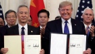 President Donald Trump signs a trade agreement with Chinese Vice Premier Liu He