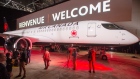 People take pictures of Air Canada's new Airbus A220, January 15, 2020 in Montreal. The Canadian Pre
