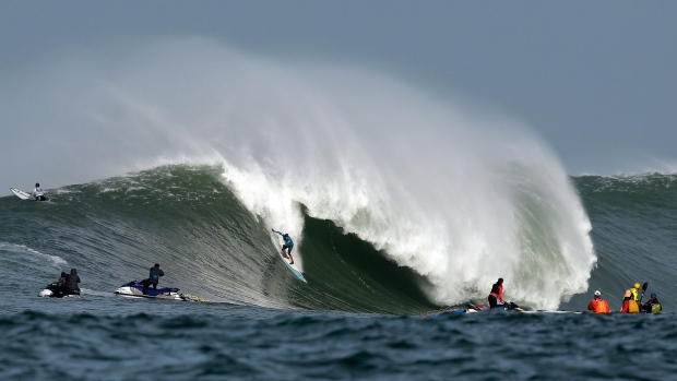 HALF MOON BAY, CA - JANUARY 24: Peter Mel rides a wave during the second heat of round one of Mavericks Invitational on January 24, 2014 in Half Moon Bay, California. (Photo by Ezra Shaw/Getty Images)