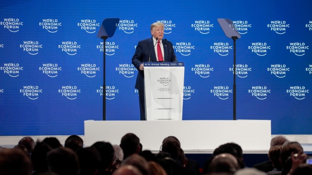 Donald Trump delivers a speech on the opening day of the World Economic Forum in Davos on Jan. 21. Photographer: Jason Alden/Bloomberg