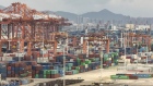 Containers and gantry cranes stand at Haitian Container Terminal, operated by the Xiamen Port Authority, in Xiamen, China, on Monday, Aug. 26, 2019. After a weekend of confusing signals, only a few negotiators in Beijing see a deal possible ahead of the 2020 U.S. election, in part because its dangerous to advise President Xi Jinping to sign a deal that Trump may eventually break, according to Chinese officials familiar with the talks who asked not to be identified. Photographer: Bloomberg/Bloomberg