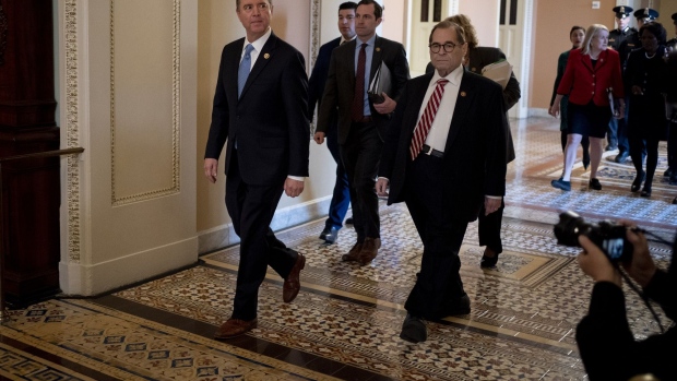 Representative Adam Schiff, a Democrat from California, left, and Representative Jerry Nadler, a Democrat from New York, right, walk to the Senate floor during the impeachment trial against President Donald Trump in Washington, D.C., U.S., on Thursday, Jan. 23, 2020.  Photographer: Andrew Harrer/Bloomberg