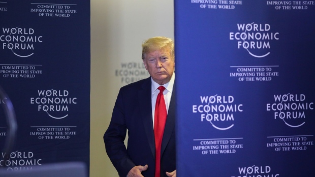 Donald Trump arrives for a news conference at the World Economic Forum in Davos on Jan. 22. Photographer: Simon Dawson/Bloomberg