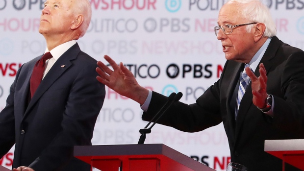 LOS ANGELES, CALIFORNIA - DECEMBER 19: Sen. Bernie Sanders (I-VT) (R) speaks as former Vice President Joe Biden listens during the Democratic presidential primary debate at Loyola Marymount University on December 19, 2019 in Los Angeles, California. Seven candidates out of the crowded field qualified for the 6th and last Democratic presidential primary debate of 2019 hosted by PBS NewsHour and Politico. (Photo by Justin Sullivan/Getty Images) Photographer: Justin Sullivan/Getty Images North America