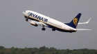 A Boeing Co. 737 aircraft, operated by Ryanair Holdings Plc, takes off from Tegel airport in Berlin, Germany, on Monday, July 29, 2019. Deutsche Lufthansa AG is considering a shift to a corporate holding structure, seeking to streamline Europe's biggest airline group as it fights for market share. Photographer: Krisztian Bocsi/Bloomberg