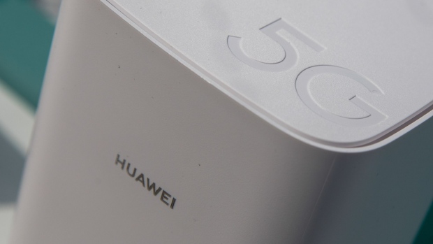 A 5G CPE (customer-premises equipment) Pro router, manufactured by Huawei Technologies Co., sits on a display following a news conference announcing the rollout of BT Group Plc's EE 5G network in London, U.K., on Wednesday, May 22, 2019. BT won't offer phones from Huawei when it starts Britain's first 5G mobile network next week in the face of a U.S. crackdown on the Chinese firm. Photographer: Chris Ratcliffe/Bloomberg