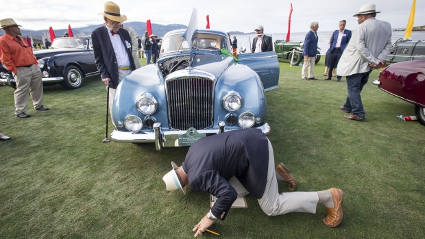 Judges view a 1954 BentleyMotors Ltd. R-Type Continental during the Pebble Beach Concours d'Elegance