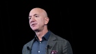 Jeff Bezos, founder and chief executive officer of Amazon.com Inc., speaks during a news conference 