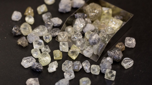 A collection of rough diamonds sit on a sorting table during processing at the United Selling Organisation (USO) of Alrosa PJSC sorting center in Moscow, Russia, on Tuesday, Feb. 12, 2019. 