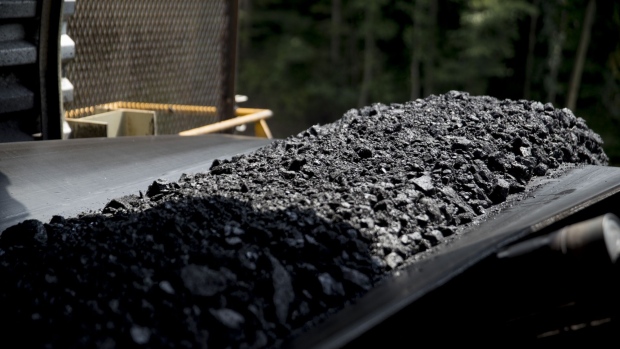 Raw coal moves on a stacker machine at the newly opened Ramaco Resources Inc. Stonecoal Alma mine near Wylo, West Virginia, U.S., on Tuesday, Aug. 8, 2017. From 2008 to 2016 production from West Virginia’s southern coalfields fell from 117 million tons to 36.6 million, now, the trend is reversing. With prices tripling over the last year for metallurgical coal, which is used in steel-making and hard to find elsewhere in North America, through mid-April of this year, coal output rose 9 percent in southern West Virginia compared with a year ago, according to the U.S. Energy Information Administration. Photographer: Andrew Harrer/Bloomberg