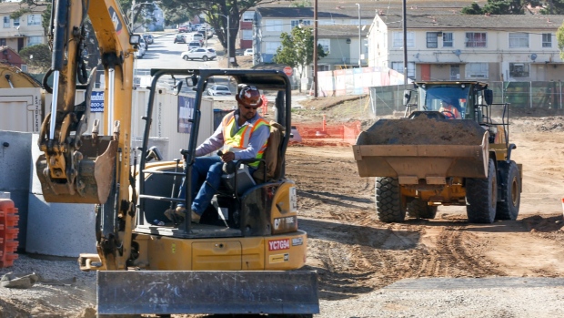 Contractors operate heavy machinery at the construction site of the Sunnydale Hope SF housing redevelopment project in the Sunnydale neighborhood of San Francisco, California, U.S., on Wednesday, Oct. 30, 2019.